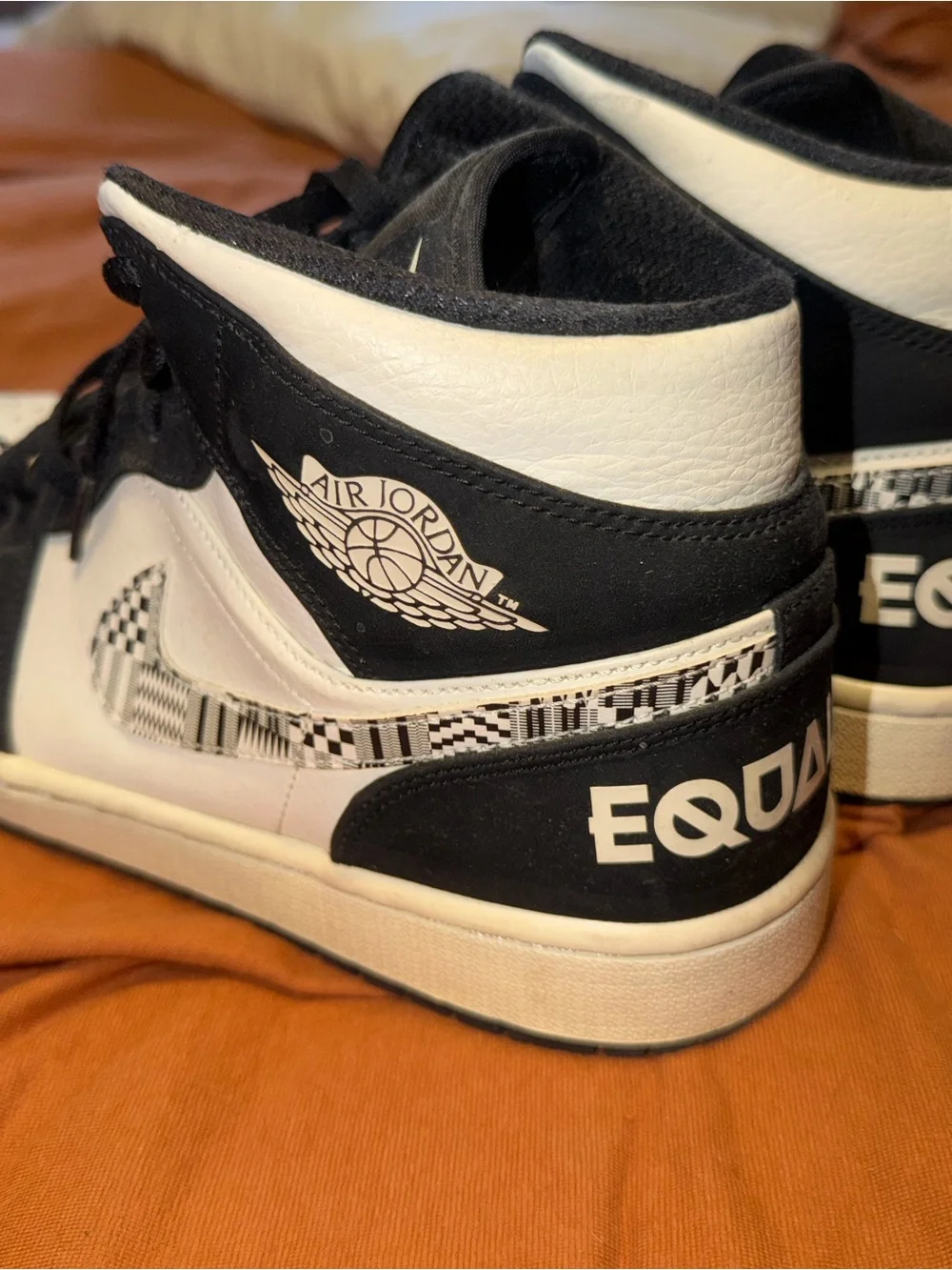 LIMITED SALE! Jordan 1 “Equality” High-Top Sneakers in Black and White